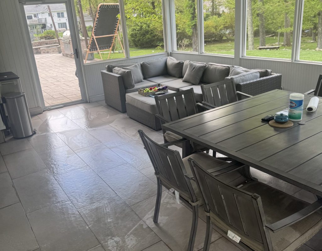 Professional house cleaner working in Murphy, TX modern living room